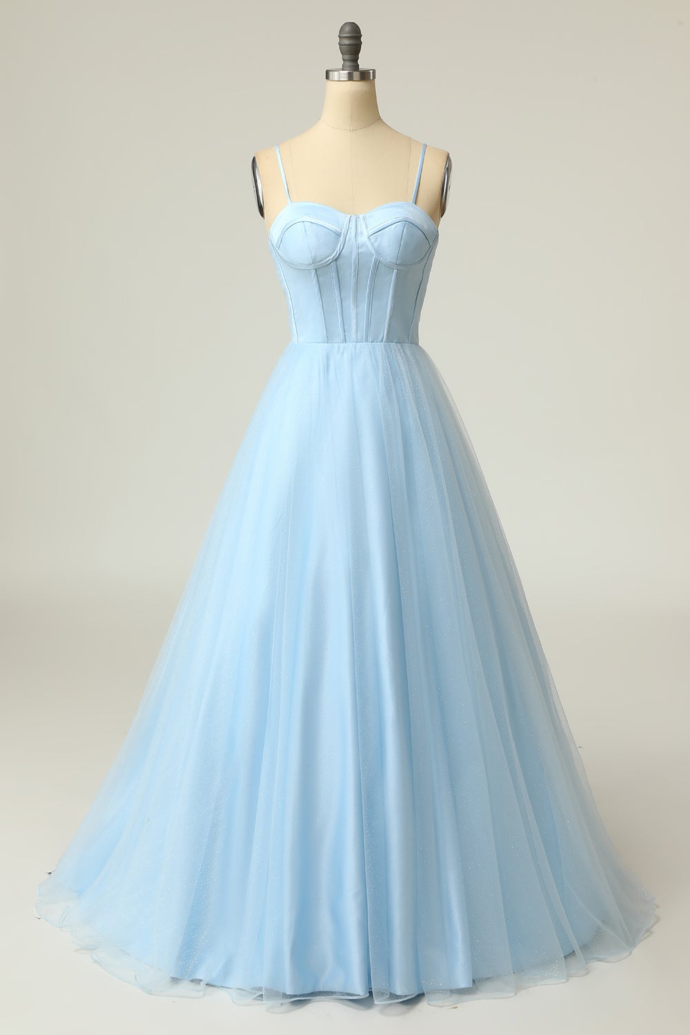 Light purple long prom dress with spaghetti straps in an A-line cut