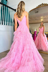 Pink long prom dress with spaghetti straps and ruffles in an A-line silhouette