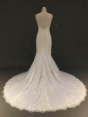 Luxurious Trumpet/Mermaid Illusion Tulle Court Train Wedding Dress With Appliques Lace