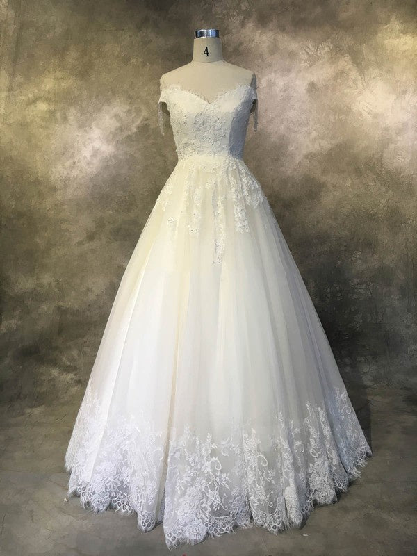 Off-the-shoulder Tulle Court Train Wedding Dress with Beading for a Ball Gown Look
